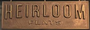 Heirloom Flats Bronze plaque by Buccacio Sculpture Services